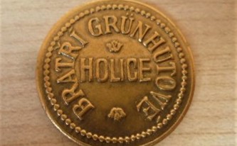 Mincovní žeton židovských bratrů Grünhutů